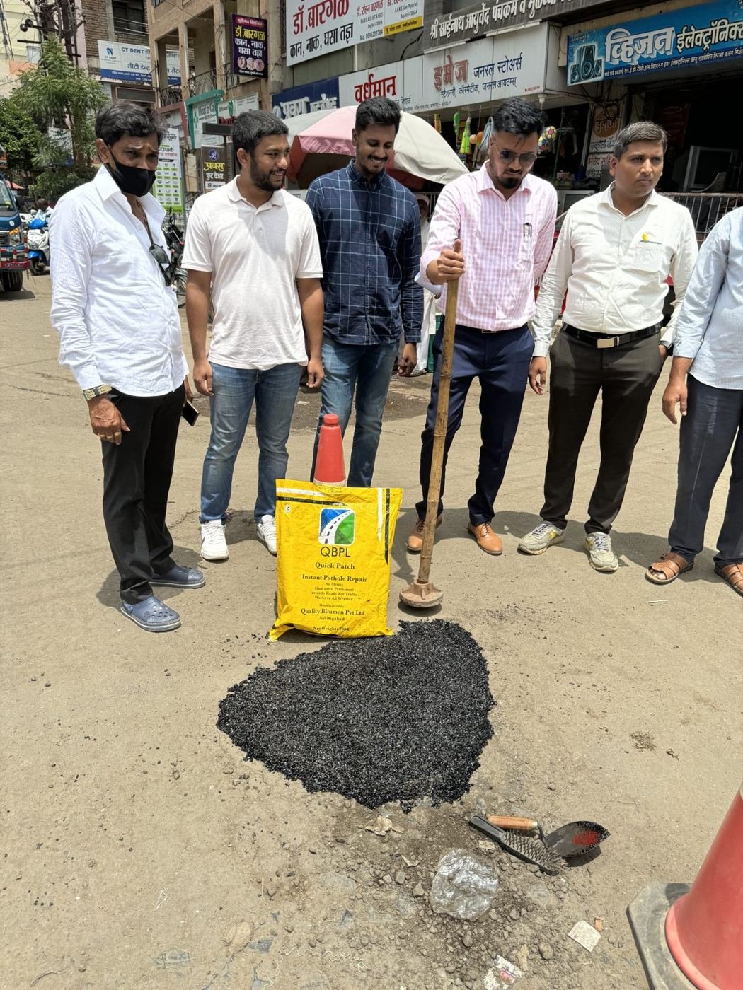 Officials inspecting a completed Quick Patch repair
